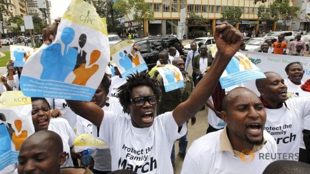 Protesters chant slogans against the lesbian, gay, bisexual and transgender community as they march along the streets of  Kenya's capital, Nairobi, on Monday. The demonstration is aimed at President Obama, who is set to visit the country later this month. (Thomas Mukoya/Reuters)