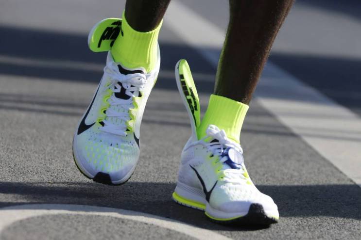 Eliud Kipchoge's shoes during the Berlin Marathon. PHOTO: HANNIBAL HANSCHKE/REUTERS